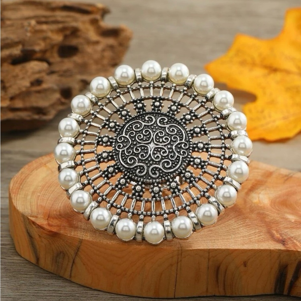 Silver and White Pearl Ring with Intricate Design
